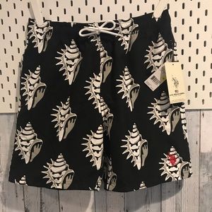 NWT men’s swim trunks in black with white shells.